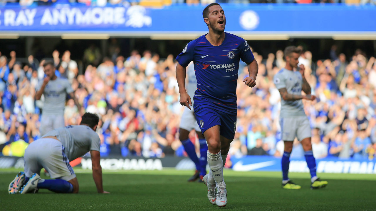 LONDON, ENGLAND - SEPTEMBER 15: Eden Hazard of Chelsea celebrates scoring the equalising goal during the Premier League match between Chelsea FC and Cardiff City at Stamford Bridge on September 15, 2018 in London, United Kingdom.