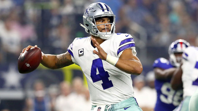 ARLINGTON, TX - SEPTEMBER 16: Dak Prescott #4 of the Dallas Cowboys looks to pass against the New York Giants in the first quarter of a football game at AT&T Stadium on September 16, 2018 in Arlington, Texas.