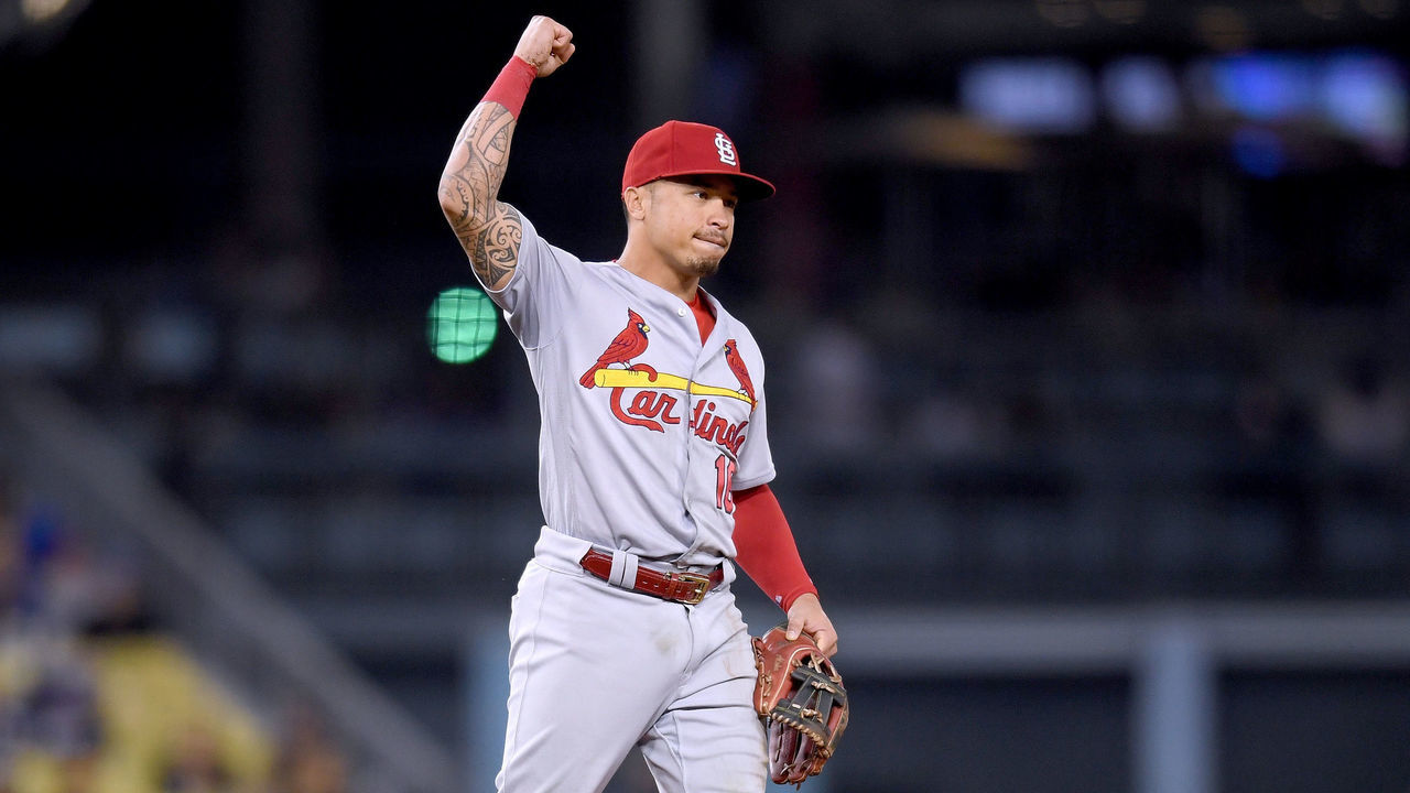 LOS ANGELES, CA - AUGUST 21: Kolten Wong #16 of the St. Louis Cardinals celebrates the third out of the ninth inning for a 5-2 victory over the Los Angeles Dodgers at Dodger Stadium on August 21, 2018 in Los Angeles, California.