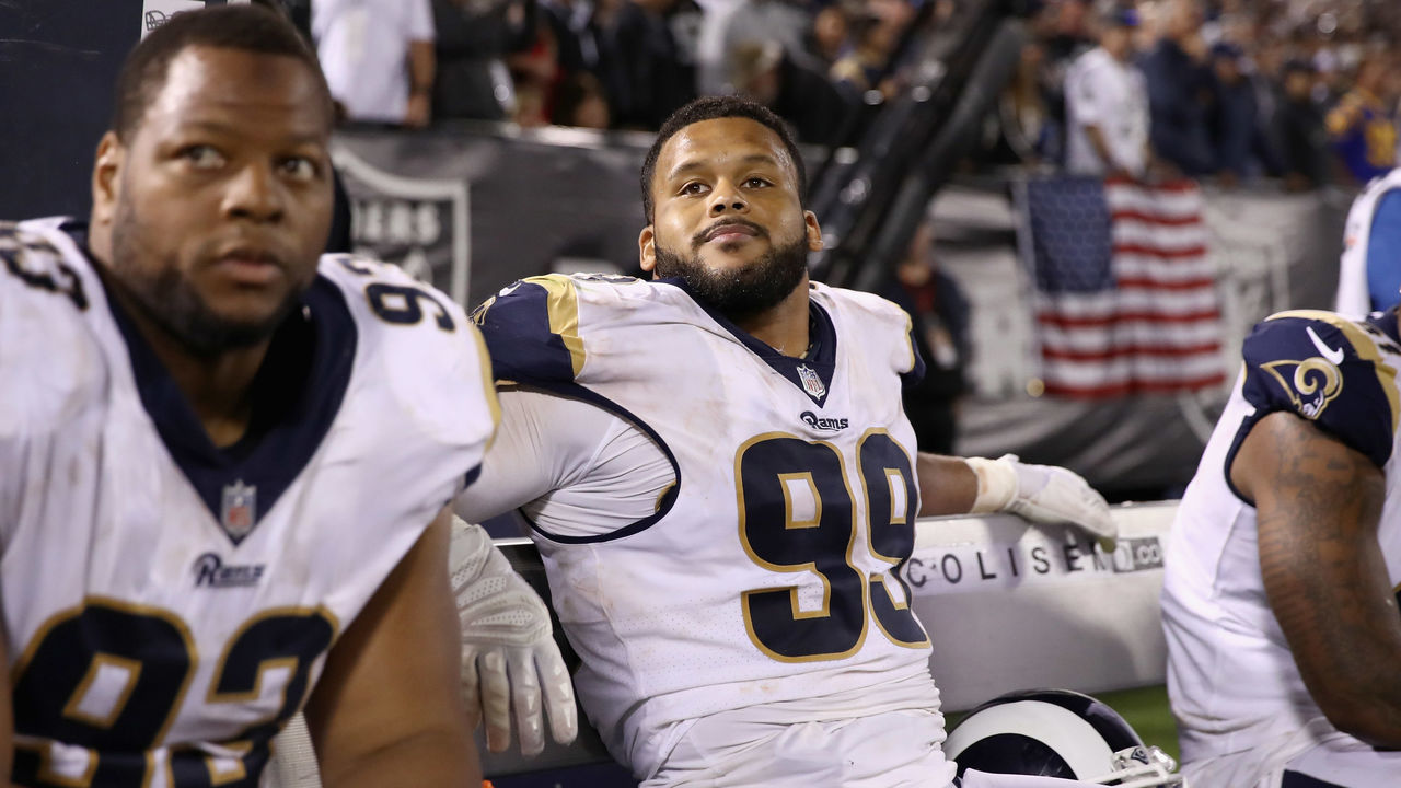 OAKLAND, CA - SEPTEMBER 10: Aaron Donald #99 of the Los Angeles Rams sits on the bench during their game against the Oakland Raiders at Oakland-Alameda County Coliseum on September 10, 2018 in Oakland, California.