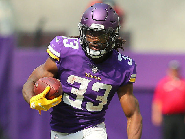 MINNEAPOLIS, MN - SEPTEMBER 09: Dalvin Cook #33 of the Minnesota Vikings carries the ball while pursued by K'Waun Williams #24 of the San Francisco 49ers in the first half of the game at U.S. Bank Stadium on September 9, 2018 in Minneapolis, Minnesota.