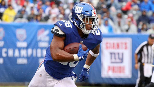 EAST RUTHERFORD, NJ - SEPTEMBER 09: Saquon Barkley #26 of the New York Giants runs with the ball in the second half against the Jacksonville Jaguars at MetLife Stadium on September 9, 2018 in East Rutherford, New Jersey.