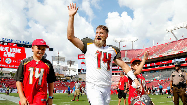 TAMPA, FL - SEPTEMBER 16: Ryan Fitzpatrick #14 of the Tampa Bay Buccaneers waves to the crowd after they defeated the Philadelphia Eagles 27-21 at Raymond James Stadium on September 16, 2018 in Tampa, Florida.