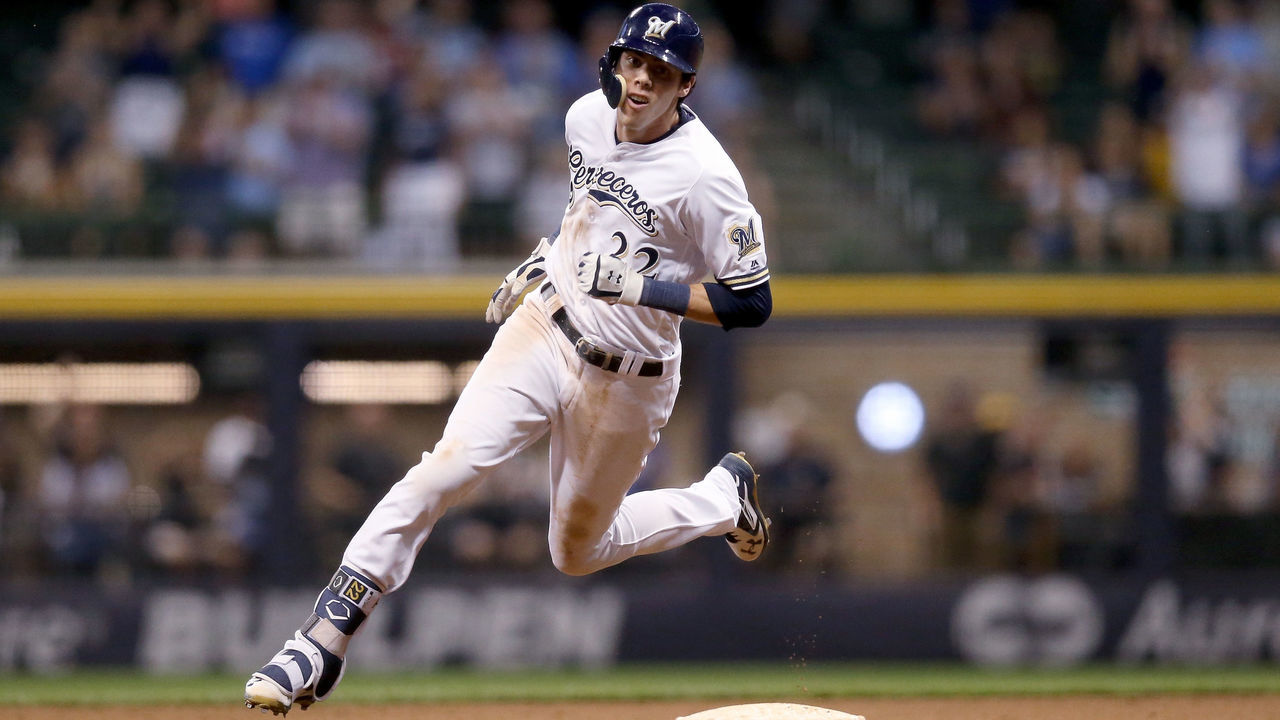 MILWAUKEE, WI - SEPTEMBER 17: Christian Yelich #22 of the Milwaukee Brewers runs to third base for a triple in the sixth inning against the Cincinnati Reds at Miller Park on September 17, 2018 in Milwaukee, Wisconsin.