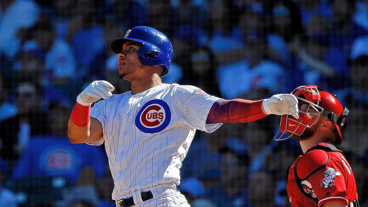 CHICAGO, IL - SEPTEMBER 16: Willson Contreras #40 of the Chicago Cubs tosses his bat as he watches his double against the Cincinnati Reds during the fifth inning at Wrigley Field on September 16, 2018 in Chicago, Illinois.
