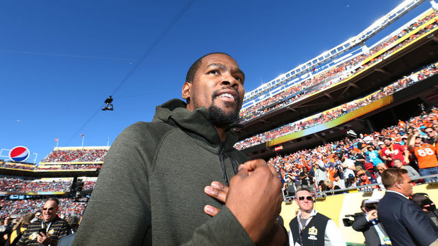 SANTA CLARA, CA - FEBRUARY 07: Kevin Durant of the Oklahoma City Thunder looks on during warm ups prior to Super Bowl 50 between the Denver Broncos and the Carolina Panthers at Levi's Stadium on February 7, 2016 in Santa Clara, California.