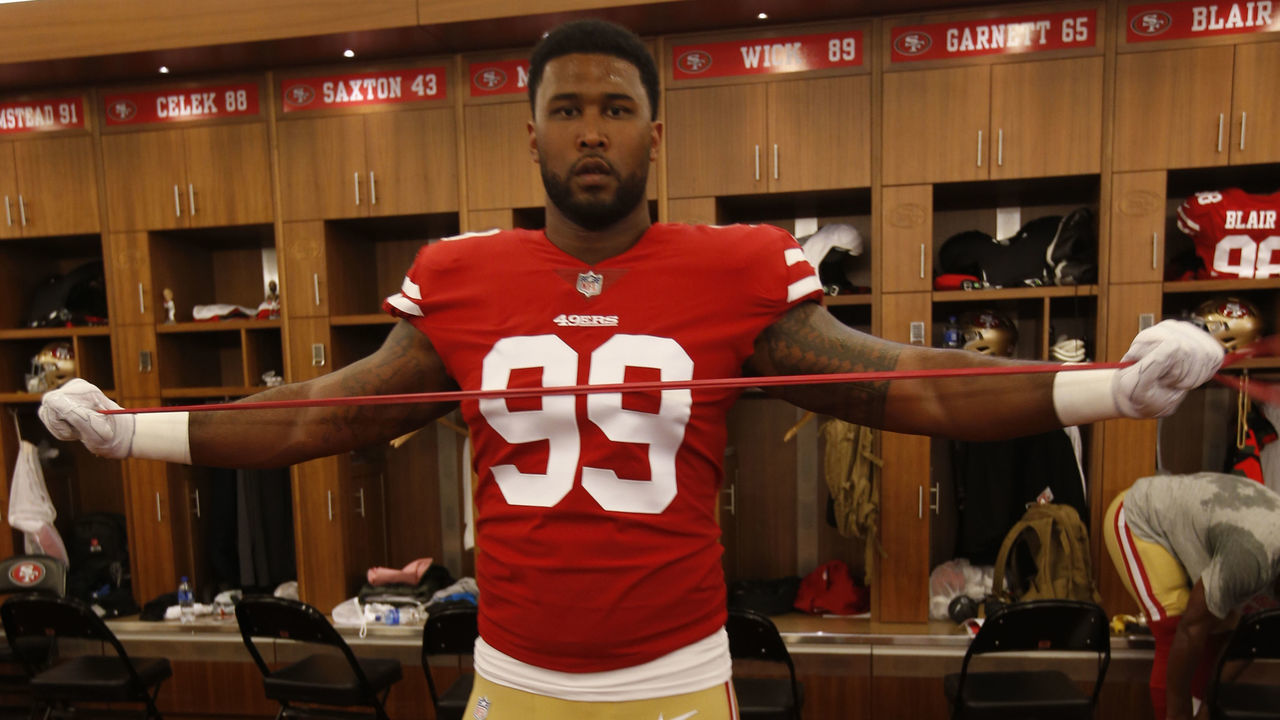 SANTA CLARA, CA - AUGUST 9: DeForest Buckner #99 of the San Francisco 49ers stretches in the locker room prior to the game against the Dallas Cowboys at Levi Stadium on August 9, 2018 in Santa Clara, California. The 49ers defeated the Cowboys 24-21.