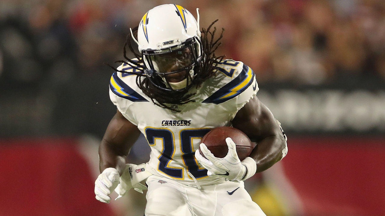GLENDALE, AZ - AUGUST 11: Running back Melvin Gordon #28 of the Los Angeles Chargers rushes the football against the Arizona Cardinals during the preseason NFL game at University of Phoenix Stadium on August 11, 2018 in Glendale, Arizona.