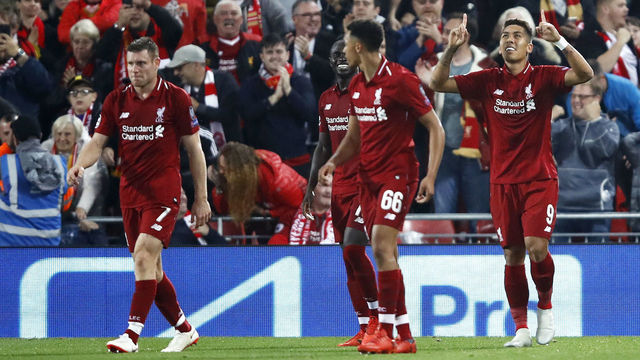 LIVERPOOL, ENGLAND - SEPTEMBER 18: Roberto Firmino of Liverpool celebrates after scoring his team's third goal during the Group C match of the UEFA Champions League between Liverpool and Paris Saint-Germain at Anfield on September 18, 2018 in Liverpool, United Kingdom.