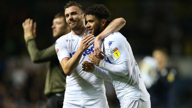 Leeds United's Tyler Roberts (right) and Stuart Dallas celebrate after the final whistle during the Sky Bet Championship match at Elland Road, Leeds.