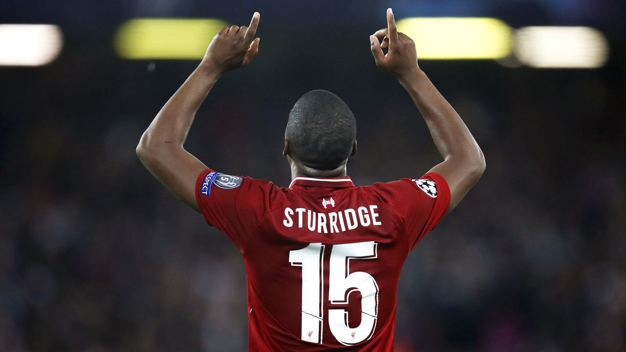 LIVERPOOL, ENGLAND - SEPTEMBER 18: Daniel Sturridge of Liverpool celebrates as he scores his team's first goal during the Group C match of the UEFA Champions League between Liverpool and Paris Saint-Germain at Anfield on September 18, 2018 in Liverpool, United Kingdom.