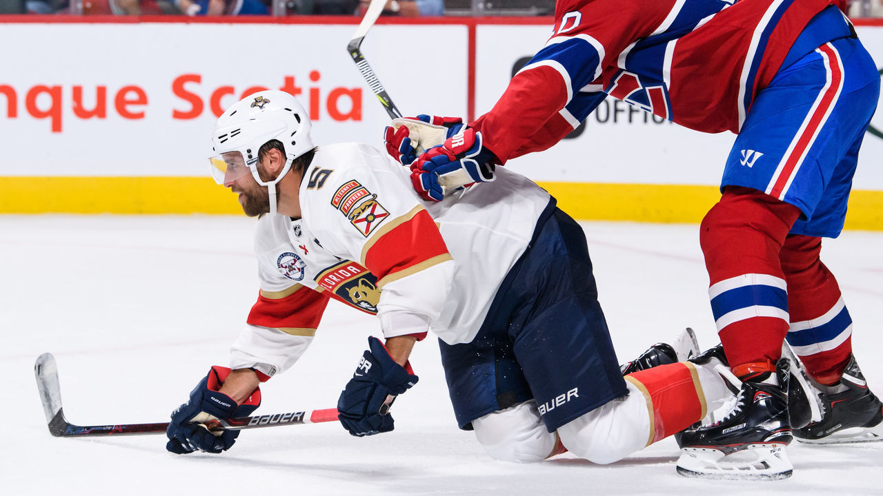 MONTREAL, QC - SEPTEMBER 19: Montreal Canadiens right wing Joel Armia (40) checks Florida Panthers defenseman Aaron Ekblad (5) during the second period of the NHL preseason game between the New Florida Panthers and the Montreal Canadiens on September 19, 2018, at the Bell Centre in Montreal, QC