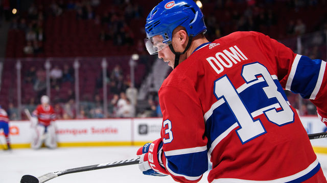 MONTREAL, QC - SEPTEMBER 19: Montreal Canadiens left wing Max Domi (13) plays with the puck during the warm-up of the NHL preseason game between the New Florida Panthers and the Montreal Canadiens on September 19, 2018, at the Bell Centre in Montreal, QC