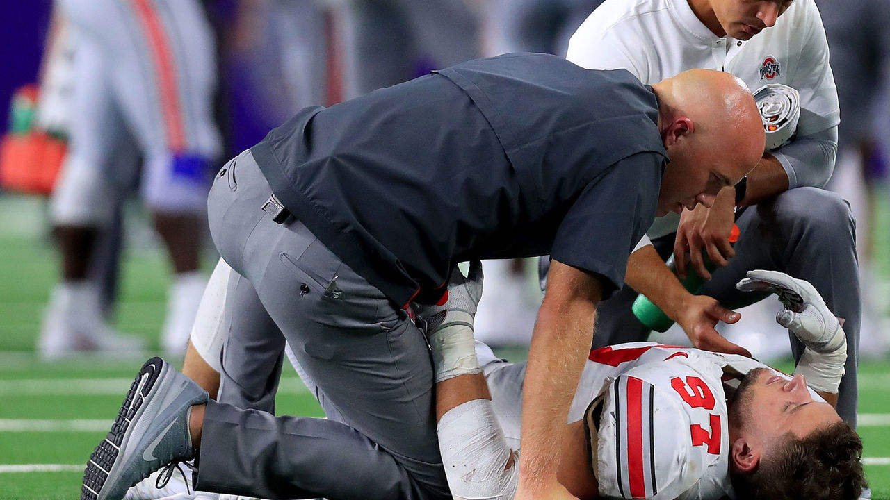 ARLINGTON, TX - SEPTEMBER 15: Nick Bosa #97 of the Ohio State Buckeyes lays on the field after being injured in the third quarter against the TCU Horned Frogs during The AdvoCare Showdown at AT&T Stadium on September 15, 2018 in Arlington, Texas.