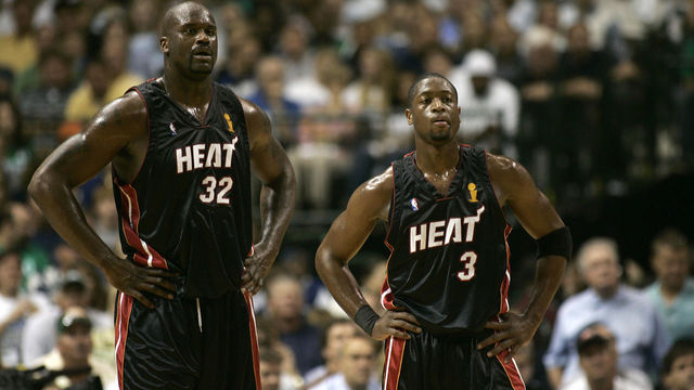 Dallas, UNITED STATES: Shaquille O'Neal (L) and Dwyane Wade of the Miami Heat look on during Game 2 of the NBA finals against the Dallas Mavericks 11 June 2006 at the American Airlines Center in Dallas. The Mavericks won 99-85 to take a 2-0 lead in the best-of-seven game series. AFP PHOTO/Robert SULLIVAN