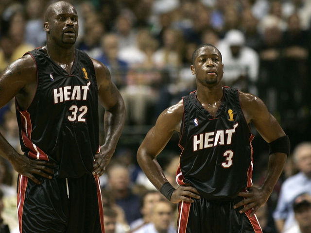 Dallas, UNITED STATES: Shaquille O'Neal (L) and Dwyane Wade of the Miami Heat look on during Game 2 of the NBA finals against the Dallas Mavericks 11 June 2006 at the American Airlines Center in Dallas. The Mavericks won 99-85 to take a 2-0 lead in the best-of-seven game series. AFP PHOTO/Robert SULLIVAN