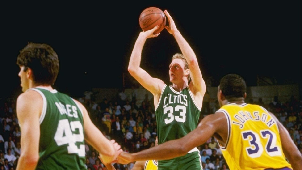 19 Feb 1988: Guard Larry Bird of the Boston Celtics shoots the ball as Magic Johnson of the Los Angeles Lakers shoots the ball during a game at the Great Western Forum in Inglewood, California. Mandatory Credit: Rick Stewart /Allsport