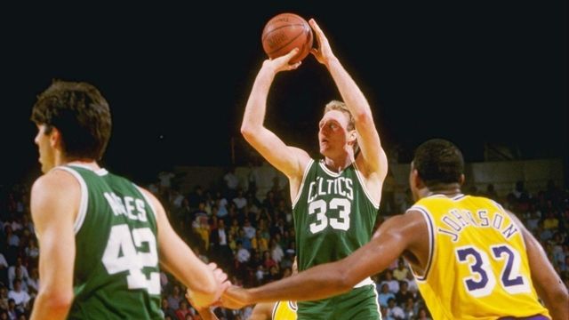 19 Feb 1988: Guard Larry Bird of the Boston Celtics shoots the ball as Magic Johnson of the Los Angeles Lakers shoots the ball during a game at the Great Western Forum in Inglewood, California. Mandatory Credit: Rick Stewart /Allsport