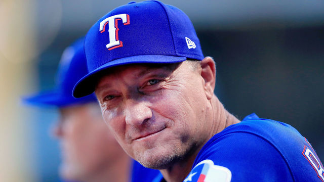 ARLINGTON, TX - AUGUST 29: Manager Jeff Banister #28 of the Texas Rangers looks on from the dugout as the Texas Rangers prepare to take on the Los Angeles Dodgers at Globe Life Park in Arlington on August 29, 2018 in Arlington, Texas.