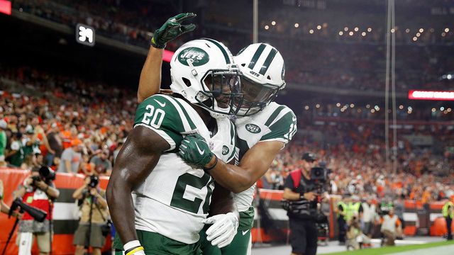 CLEVELAND, OH - SEPTEMBER 20: Isaiah Crowell #20 of the New York Jets celebrates his touchdown with Jermaine Kearse #10 during the second quarter against the Cleveland Browns at FirstEnergy Stadium on September 20, 2018 in Cleveland, Ohio.
