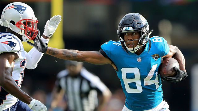 JACKSONVILLE, FL - SEPTEMBER 16: Keelan Cole #84 of the Jacksonville Jaguars attempts to run past Jason McCourty #30 of the New England Patriots during the game at TIAA Bank Field on September 16, 2018 in Jacksonville, Florida.
