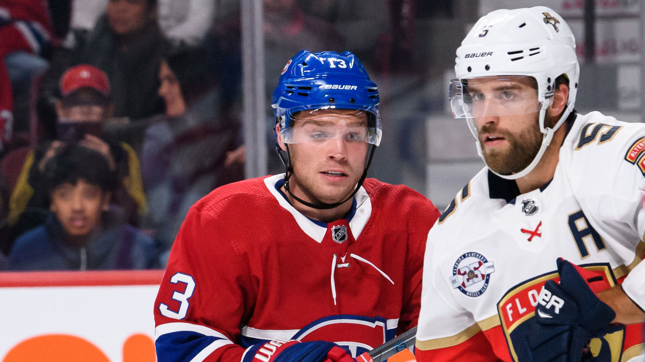 MONTREAL, QC - SEPTEMBER 19: Montreal Canadiens left wing Max Domi (13) battles with Florida Panthers defenseman Aaron Ekblad (5) for position during the second period of the NHL preseason game between the New Florida Panthers and the Montreal Canadiens on September 19, 2018, at the Bell Centre in Montreal, QC