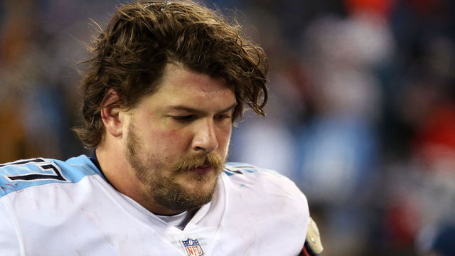 FOXBOROUGH, MA - JANUARY 13: Taylor Lewan #77 of the Tennessee Titans reacts after the AFC Divisional Playoff game against the New England Patriots at Gillette Stadium on January 13, 2018 in Foxborough, Massachusetts.