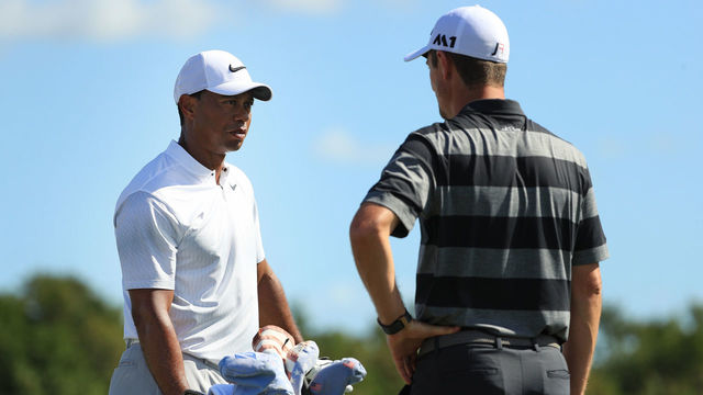 NASSAU, BAHAMAS - DECEMBER 01: Tiger Woods of the United States and Justin Rose of England talk on the range prior to the second round of the Hero World Challenge at Albany, Bahamas on December 1, 2017 in Nassau, Bahamas.