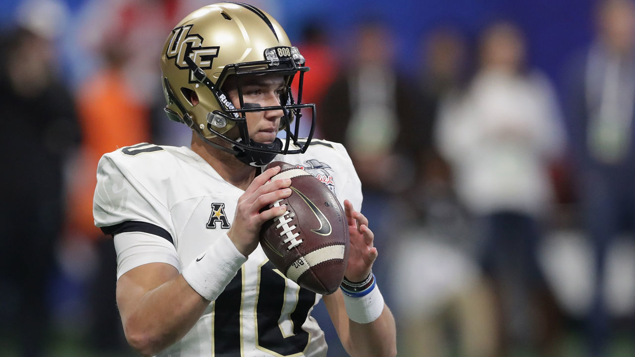 ATLANTA, GA - JANUARY 01: McKenzie Milton #10 of the UCF Knights looks to pass in the second half against the Auburn Tigers during the Chick-fil-A Peach Bowl at Mercedes-Benz Stadium on January 1, 2018 in Atlanta, Georgia.