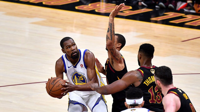 CLEVELAND, OH - JUNE 06: Kevin Durant #35 of the Golden State Warriors drives to the basket defended by Rodney Hood #1 of the Cleveland Cavaliers in the second half during Game Three of the 2018 NBA Finals at Quicken Loans Arena on June 6, 2018 in Cleveland, Ohio.