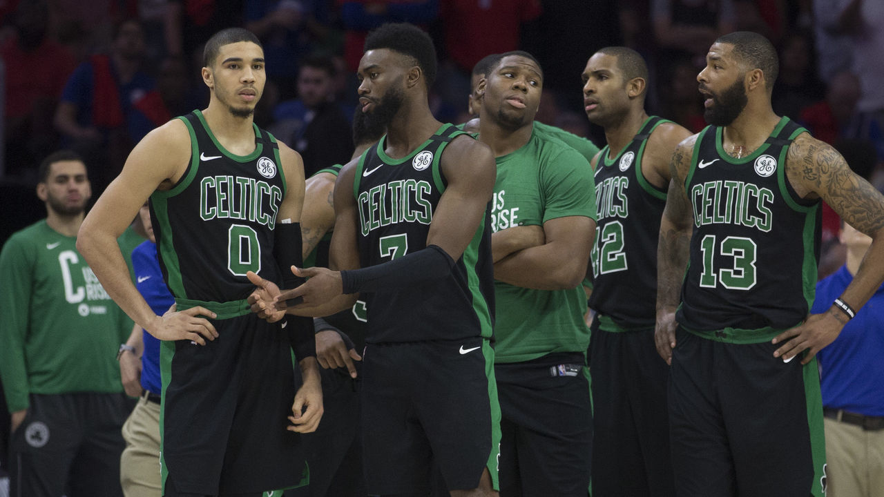 PHILADELPHIA, PA - MAY 7: Jayson Tatum #0, Jaylen Brown #7, Al Horford #42, and Marcus Morris #13 of the Boston Celtics look on from the bench against the Philadelphia 76ers during Game Four of the Eastern Conference Second Round of the 2018 NBA Playoff at Wells Fargo Center on May 7, 2018 in Philadelphia, Pennsylvania.