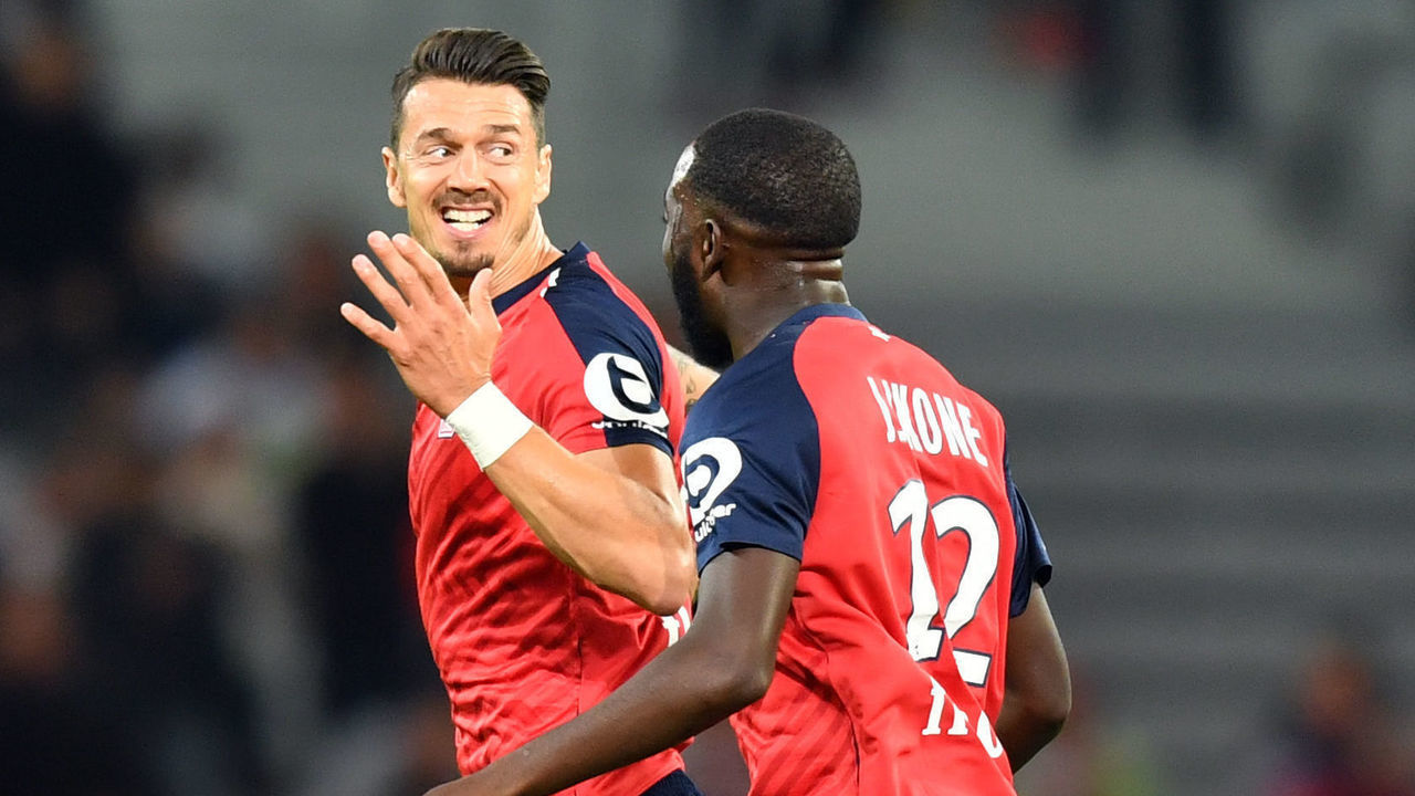 Lille's midefielder Jose Da Rocha Fonte (L) celebrates after scoring a goal during the French L1 football match between Lille (LOSC) and Nantes at the Pierre-Mauroy Stadium in Villeneuve d'Ascq, near Lille, on September 22 2018.