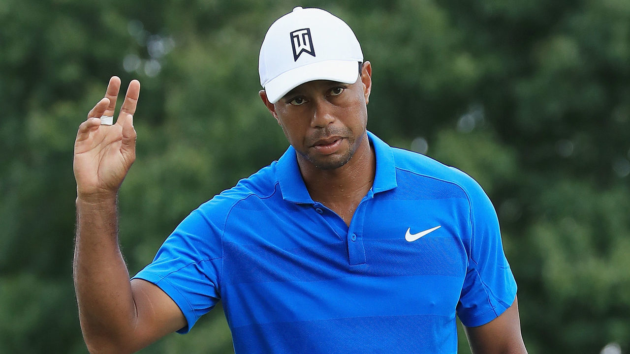 ATLANTA, GA - SEPTEMBER 22: Tiger Woods of the United States acknowledges the crowd on the third green during the third round of the TOUR Championship at East Lake Golf Club on September 22, 2018 in Atlanta, Georgia.