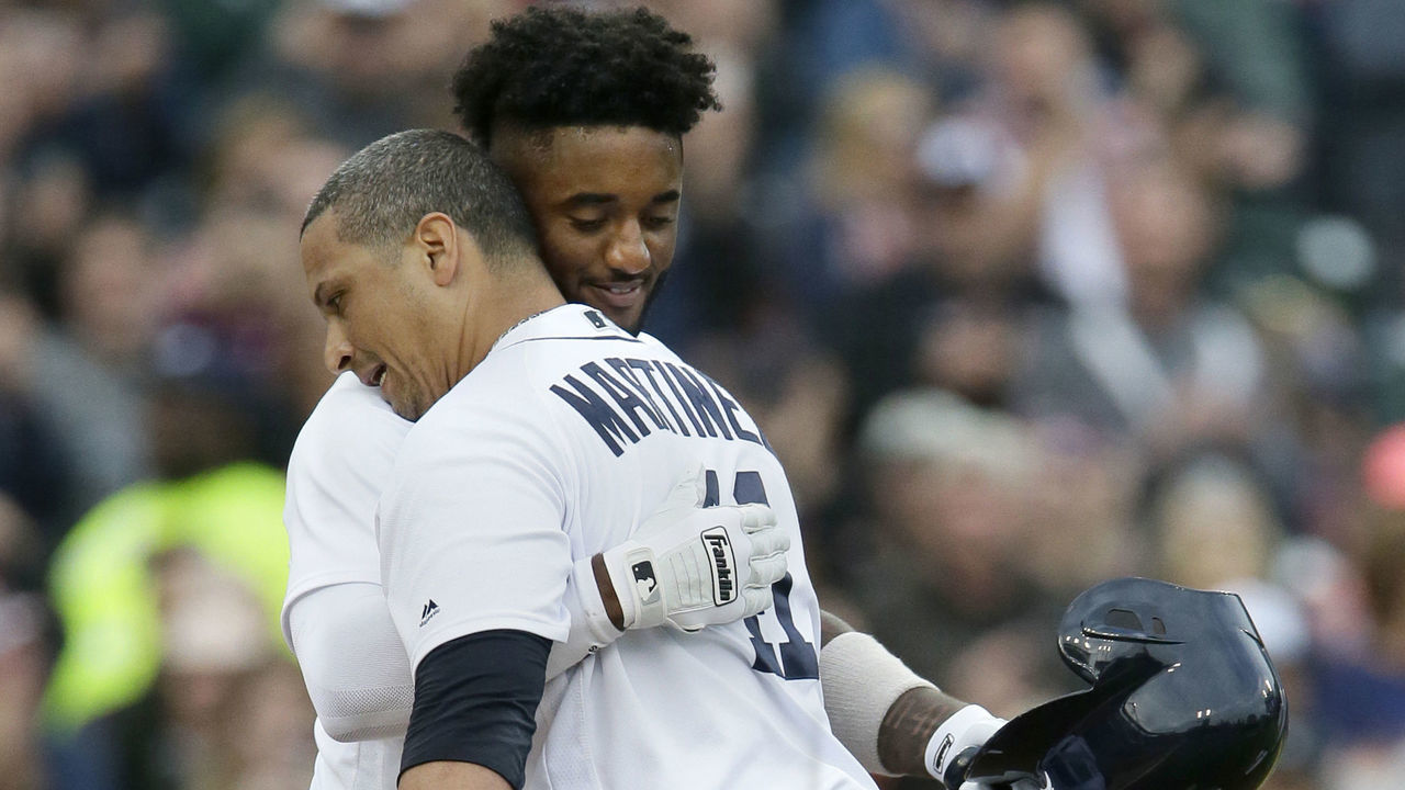 DETROIT, MI - SEPTEMBER 22: Victor Martinez #41 of the Detroit Tigers and Niko Goodrum #28 of the Detroit Tigers share a hug as Martinez leaves the game for a pinch runner after hitting a single during the first inning of his final game at Comerica Park on September 22, 2018 in Detroit, Michigan. Victor Martinez was honored during his retirement ceremony prior to the game.