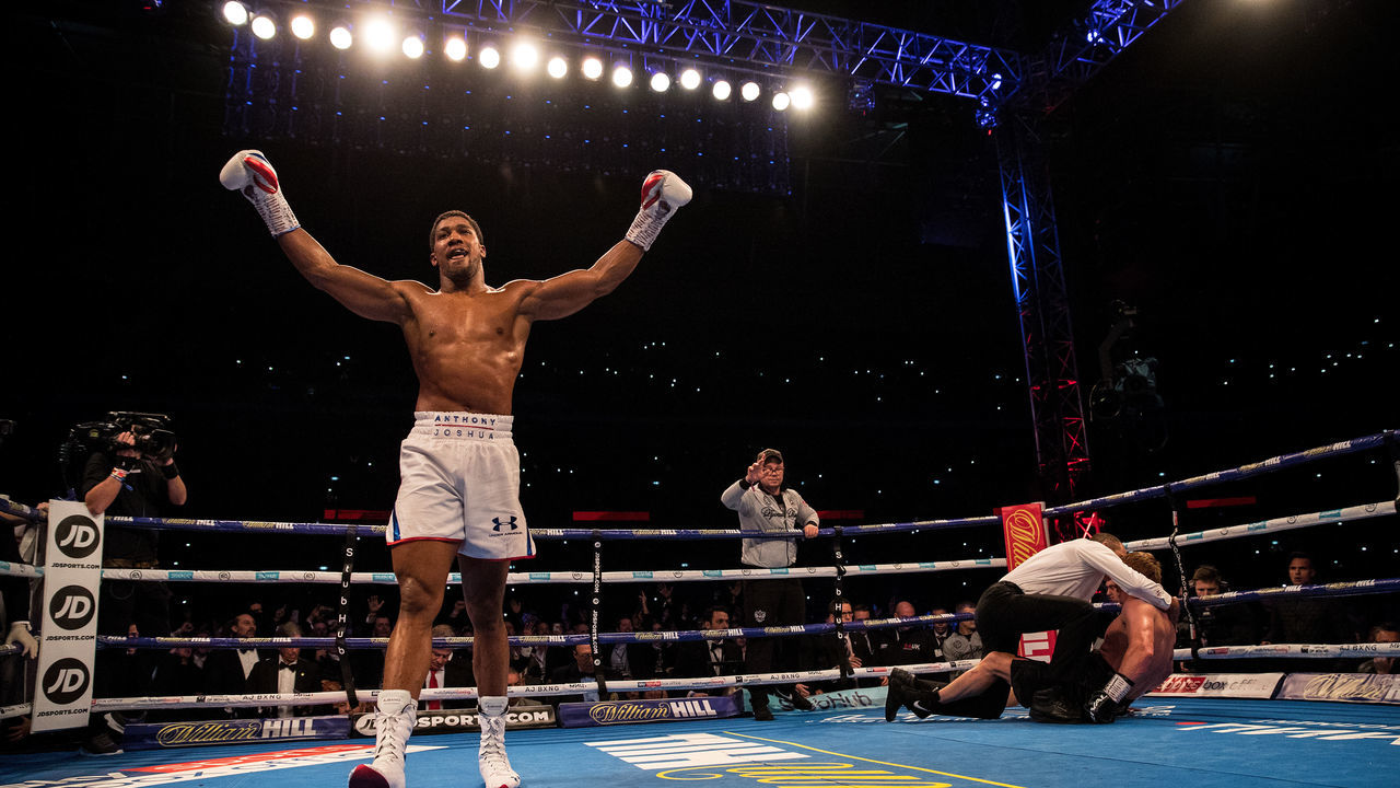 LONDON, ENGLAND - SEPTEMBER 22: Anthony Joshua celebrates victory over Alexander Povetkin during the IBF, WBA Super, WBO & IBO World Heavyweight Championship title fight between Anthony Joshua and Alexander Povetkin at Wembley Stadium on September 22, 2018 in London, England.