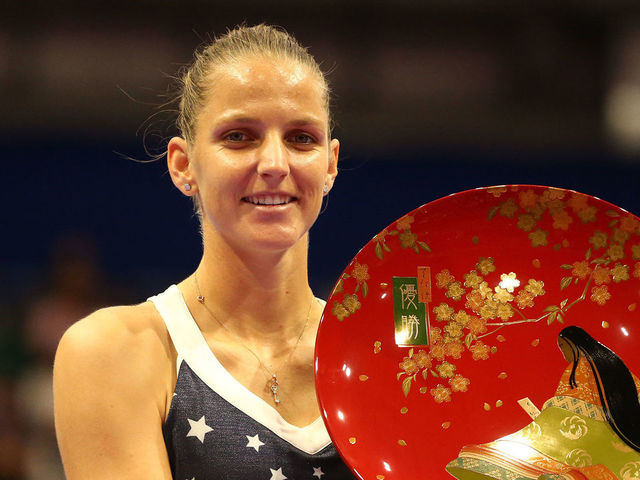 TACHIKAWA, JAPAN - SEPTEMBER 23: Singles champion Karolina Pliskova of the Czech Republic poses for photographs with the trophy after the Singles final against Naomi Osaka of Japan on day seven of the Toray Pan Pacific Open at Arena Tachikawa Tachihi on September 23, 2018 in Tachikawa, Tokyo, Japan.