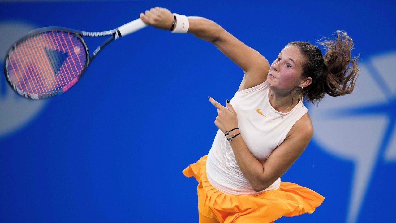 Daria Kasatkina of Russia serves against Lesia Tsurenko of Ukraine during their women's singles first round match of the WTA Wuhan Open tennis tournament in Wuhan on September 23, 2018.