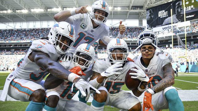 MIAMI, FL - SEPTEMBER 23: The Miami Dolphins celebrate after scoring a touchdown during the fourth quarter against the Oakland Raiders at Hard Rock Stadium on September 23, 2018 in Miami, Florida.