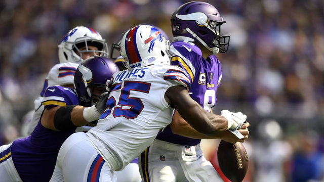 MINNEAPOLIS, MN - SEPTEMBER 23: Jerry Hughes #55 of the Buffalo Bills strips the ball out of the hands of Kirk Cousins #8 of the Minnesota Vikings in the first quarter of the game at U.S. Bank Stadium on September 23, 2018 in Minneapolis, Minnesota.