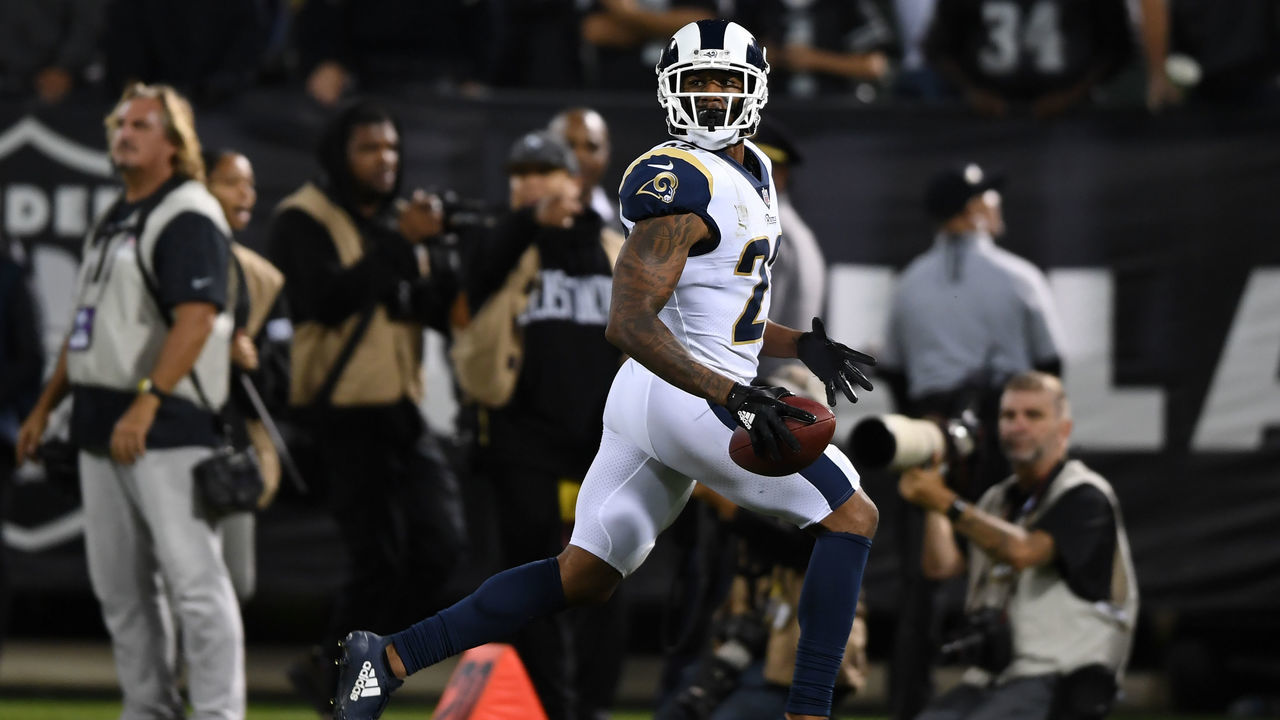 OAKLAND, CA - SEPTEMBER 10: Marcus Peters #22 of the Los Angeles Rams runs to the endzone after an interception of Derek Carr #4 of the Oakland Raiders in the fourth quarter of their NFL game at Oakland-Alameda County Coliseum on September 10, 2018 in Oakland, California.