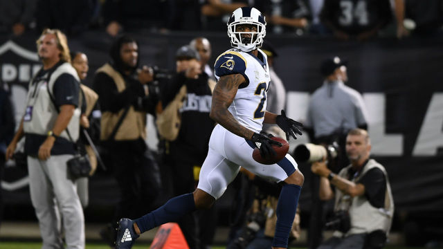 OAKLAND, CA - SEPTEMBER 10: Marcus Peters #22 of the Los Angeles Rams runs to the endzone after an interception of Derek Carr #4 of the Oakland Raiders in the fourth quarter of their NFL game at Oakland-Alameda County Coliseum on September 10, 2018 in Oakland, California.