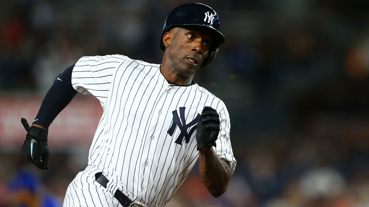 NEW YORK, NY - SEPTEMBER 14: Andrew McCutchen #26 of the New York Yankees rounds third base scoring on Aaron Hicks #31 RBI single in the first inning against the Toronto Blue Jays at Yankee Stadium on September 14, 2018 in the Bronx borough of New York City.