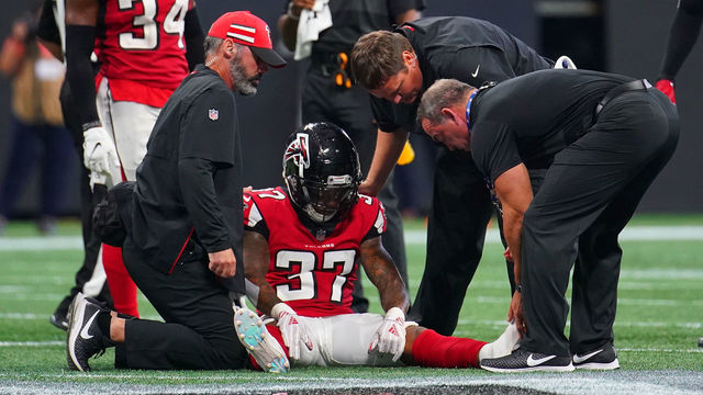 ATLANTA, GA - SEPTEMBER 23: Ricardo Allen #37 of the Atlanta Falcons sits on the field with trainers after an injury during the second half against the New Orleans Saints at Mercedes-Benz Stadium on September 23, 2018 in Atlanta, Georgia.