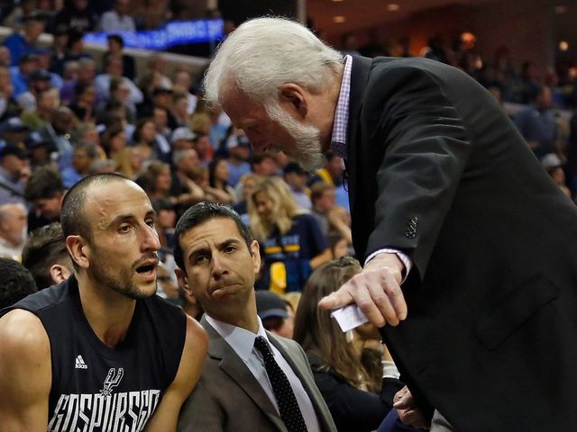 MEMPHIS, TN - APRIL 27: Head coach Gregg Popovich of the San Antonio Spurs coaches Manu Ginobili #20 during the second half of a 103-96 Spurs victory over the Memphis Grizzlies in Game 6 of the Western Conference Quarterfinals during the 2017 NBA Playoffs at FedExForum on April 27, 2017 in Memphis, Tennessee.