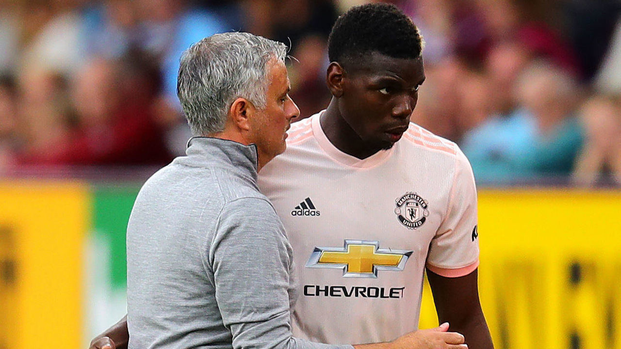 BURNLEY, ENGLAND - SEPTEMBER 02: Manchester United manager Jose Mourinho embraces Paul Pogba as he leaves the field after being substituted during the Premier League match between Burnley FC and Manchester United at Turf Moor on September 2, 2018 in Burnley, United Kingdom.