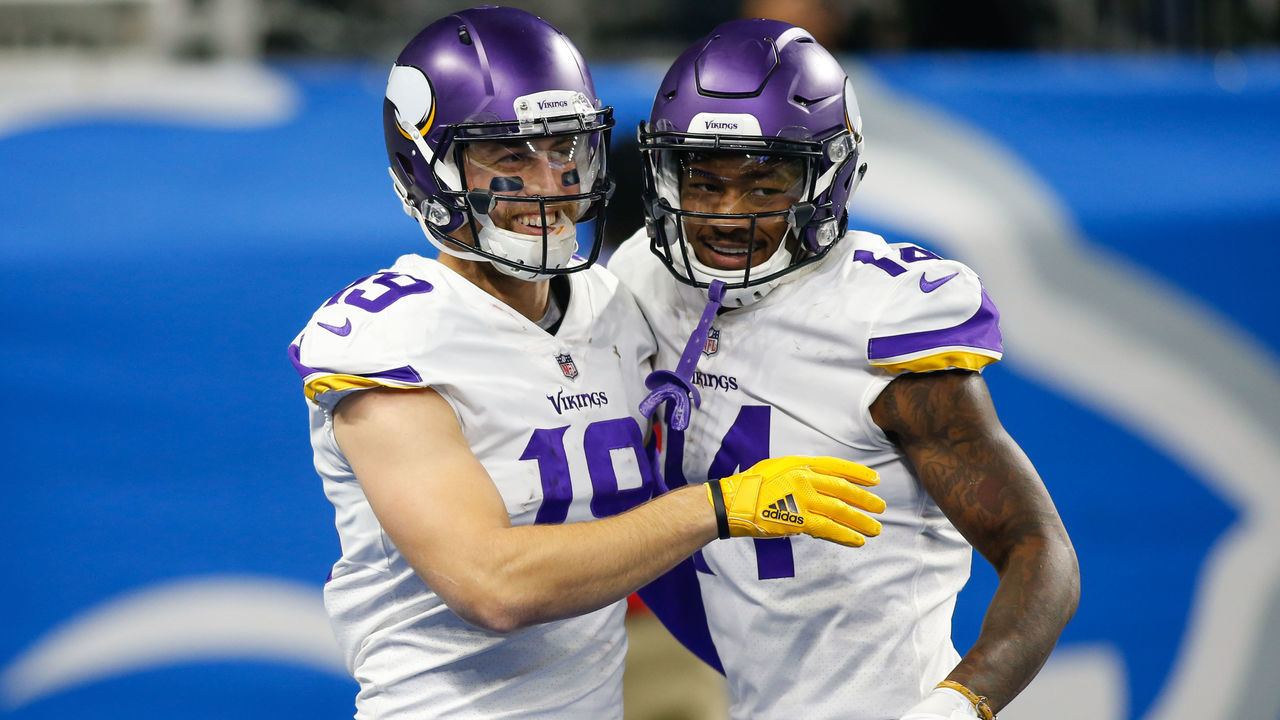 DETROIT, MI - NOVEMBER 23: Minnesota Vikings wide receiver Adam Thielen (19) and Minnesota Vikings wide receiver Stefon Diggs (14) celebrate a score during game action between the Minnesota Vikings and the Detroit Lions on November 23, 2017 at Ford Field in Detroit, Michigan.