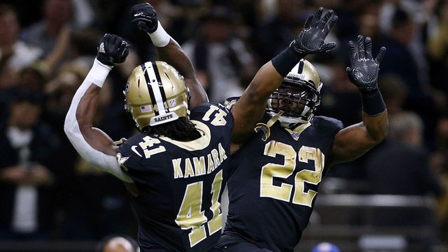 NEW ORLEANS, LA - JANUARY 07: Alvin Kamara #41 of the New Orleans Saints and Mark Ingram #22 celebrate during the second half of the NFC Wild Card playoff game against the Carolina Panthers at the Mercedes-Benz Superdome on January 7, 2018 in New Orleans, Louisiana.