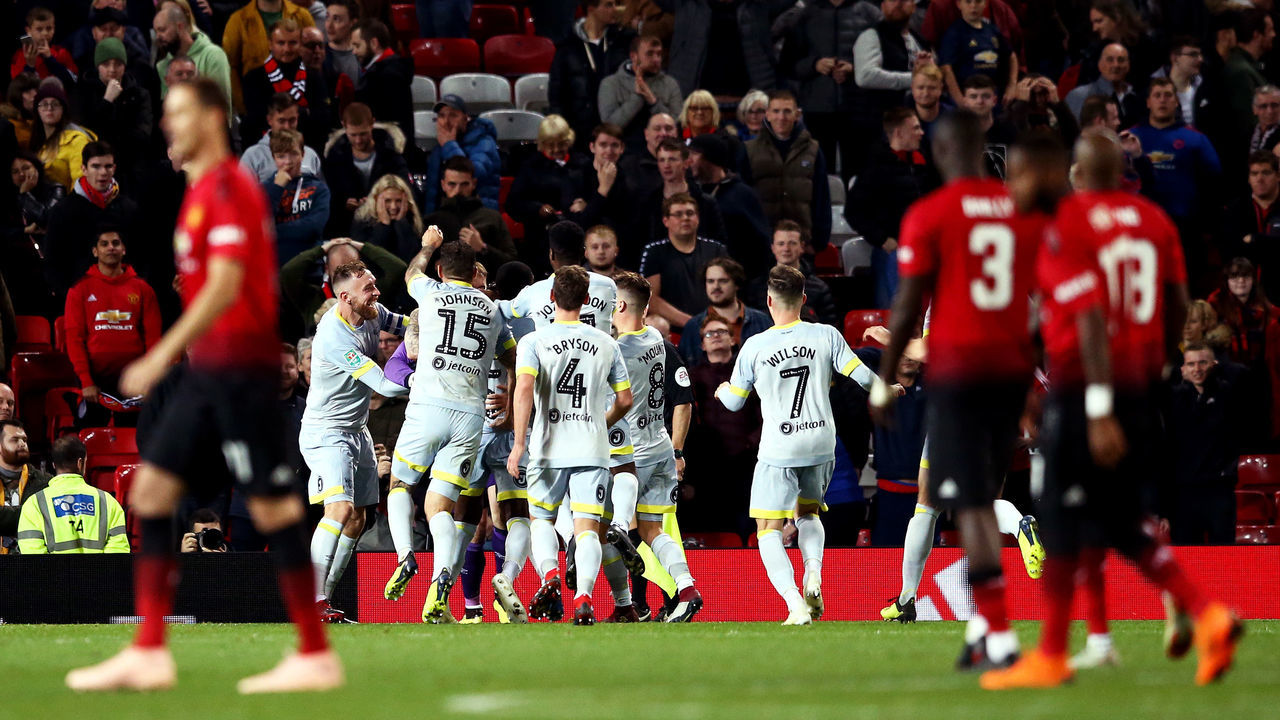 MANCHESTER, ENGLAND - SEPTEMBER 25: The Derby County team celebrate victory after a penalty shoot out in the Carabao Cup Third Round match between Manchester United and Derby County at Old Trafford on September 25, 2018 in Manchester, England.