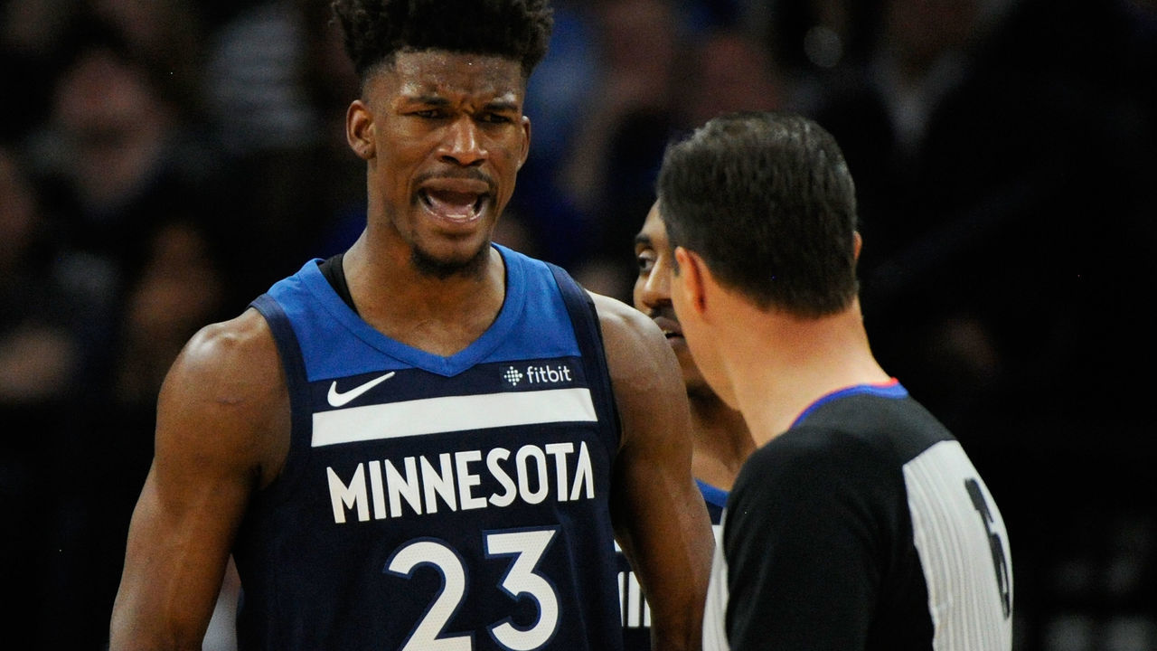MINNEAPOLIS, MN - APRIL 23: Jimmy Butler #23 of the Minnesota Timberwolves reacts to being called for a foul against the Houston Rockets during the third quarter in Game Four of Round One of the 2018 NBA Playoffs on April 23, 2018 at the Target Center in Minneapolis, Minnesota. The Rockets defeated the Timberwolves 119-100.