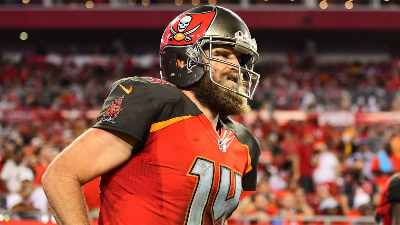 TAMPA, FL - SEPTEMBER 24: Ryan Fitzpatrick #14 of the Tampa Bay Buccaneers runs out of the locker room during the end of halftime in a game against the Pittsburgh Steelers on September 24, 2018 at Raymond James Stadium in Tampa, Florida.